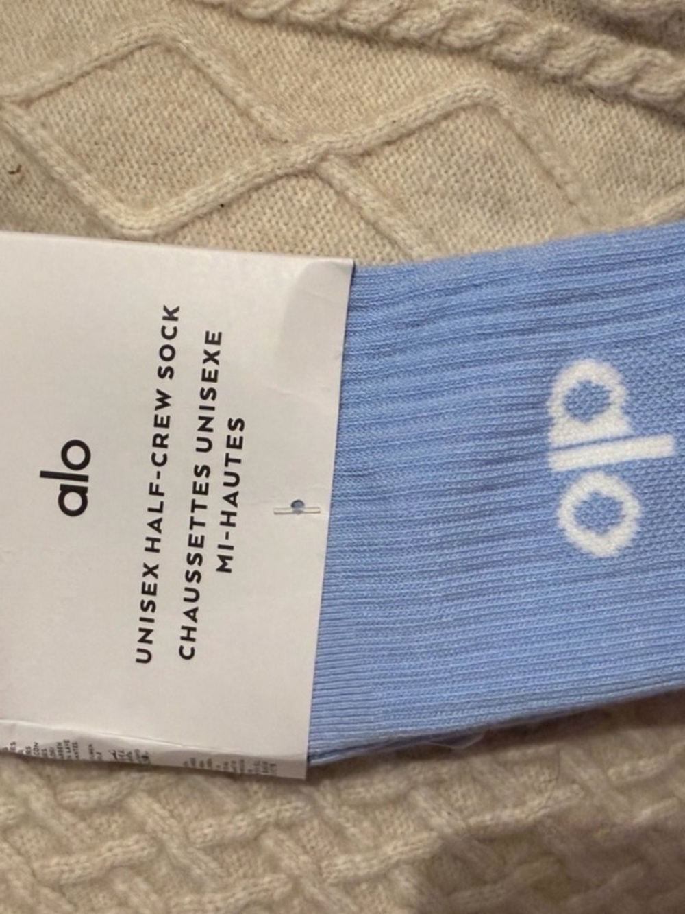 ALO Yoga Unisex Half-Crew Socks in Light Blue with White Logo